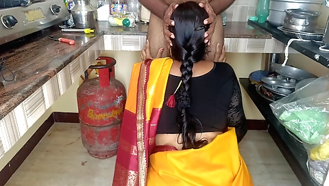 Indian brunette housewife is penetrated in a kitchen