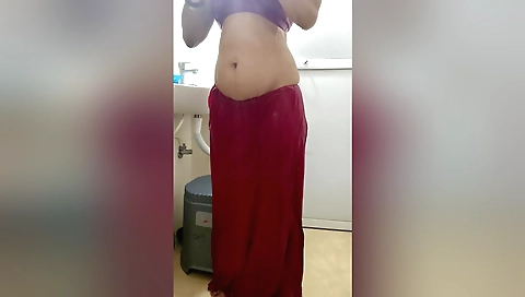 Indian bhabhi bathing in a hot bath with a nice smile