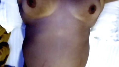 Indian girl with a beautiful ass and tits is cumming on her body