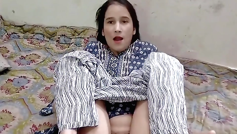 Indian slut in a sexy dress and heels is making love to herself
