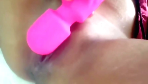 Indian girl masturbating on the bed with her favorite toys