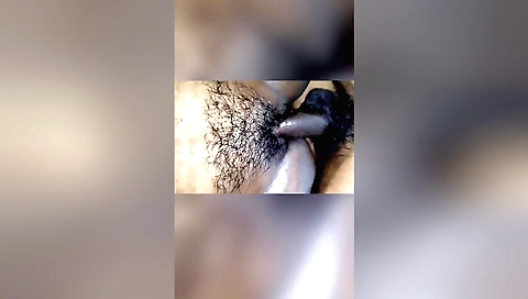 Indian hottie gets wet while licking her sexy cunt