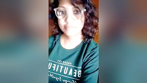 Indian girl is changing her outfit on the web camera