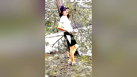 Indian brunette enjoys the sun outside in the park