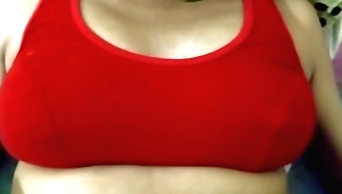 A hot indian babe in a red dress gets her lips licked