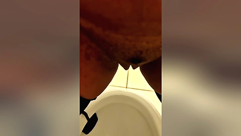 Indian solo female enjoys pissing in private bathroom
