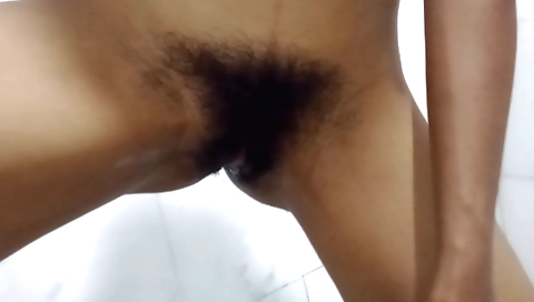 Indian girl with a shaved pussy feels her pussy getting hard