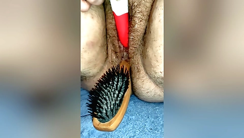 Hairy blonde girlfriend with a hairy pussy and a hairbrush