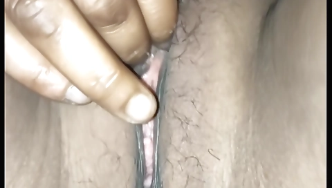 Hairy indian woman with a tight booty plays with clit