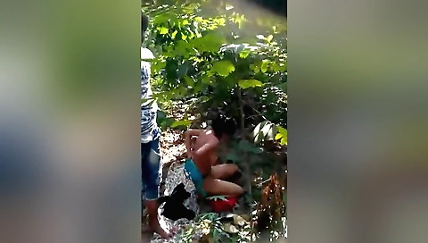 Indian brunette woman is having fun in the outdoor party