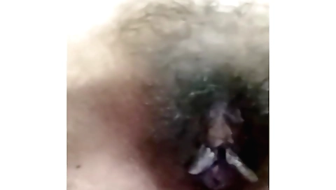 Indian girl with a hairy pussy enjoys her hairy pussy