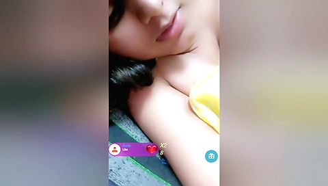 Indian pornstar has big tits and she is playing with a dildo