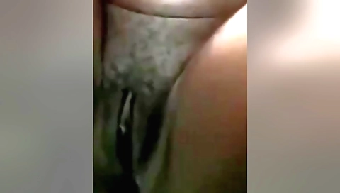 Slutty girl strips and masturbates in a sexy amateur video
