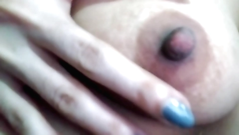 Indian girl with big boobs is showing off on a bed