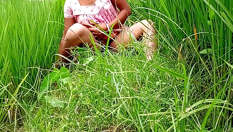 Solo female in amateur outdoor video filmed eating rice