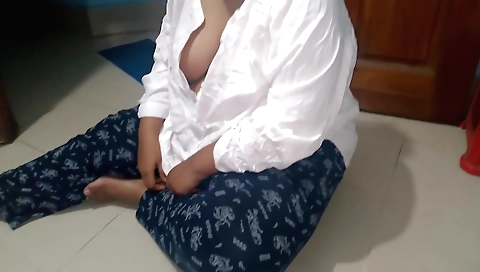 A hot amateur brunette with big tits is playing with her pussy