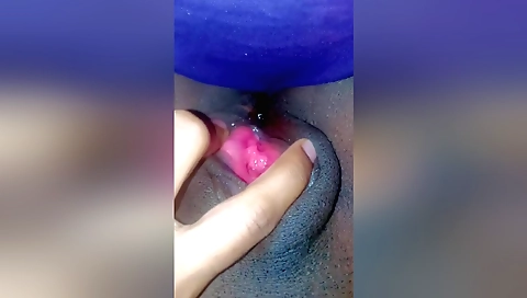Indian girl enjoys playing with her chocolate plate
