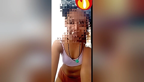 Cute brunette girl making video phone conversation