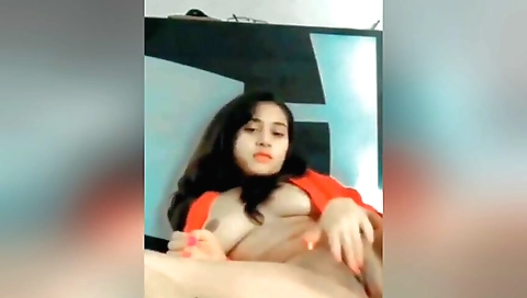 Amateur girl with amazing beauty plays with toy on webcam