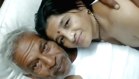 A brunette with a fat body is giving a blowjob to her stepdad