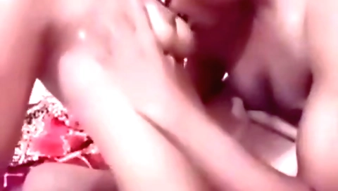 Indian girl with a nice face giving her pussy to a large dick