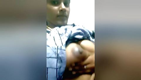 Indian amateur with a hairy pussy plays with a camera