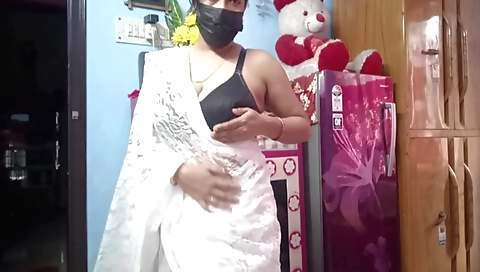 Indian stepmom with big tits plays with hairy pussy