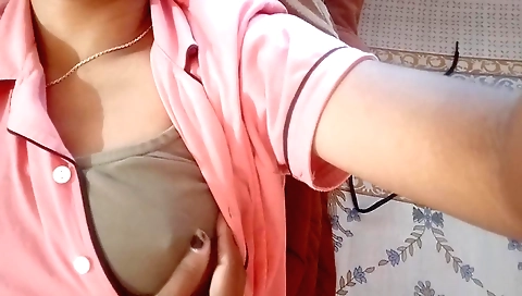 Brunette is naked in her living room and gets naked