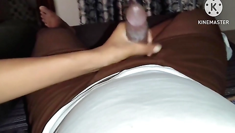 Girl with a nice figure does a nice handjob on a big dick