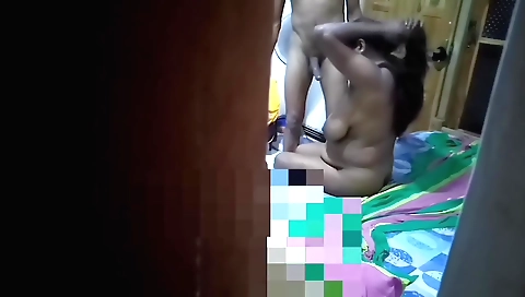 Brunette babe shows tits and ass while she sucks two cocks