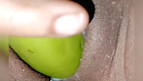 Indian girl is masturbating in the bed on her back