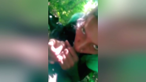 Amateur outdoor video with a gorgeous girl in the forest