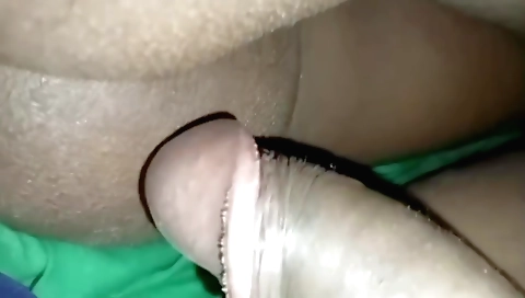 Shaved girl in a short hair is on a bed getting fucked