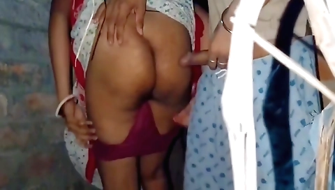 Indian teen in red dress and pink stockings goes to the village
