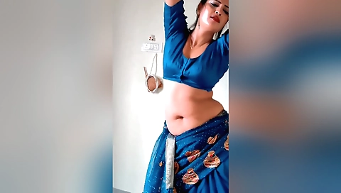 Indian brunette with small boobies takes off clothes