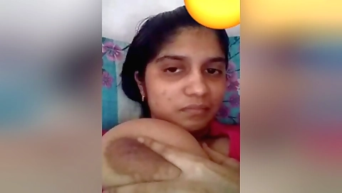 Indian brunette with big boobs showing off her body