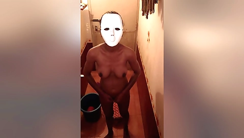Indian brunette in the bathroom doing some body massage