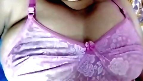 Indian woman with big boobs riding her man on the bed